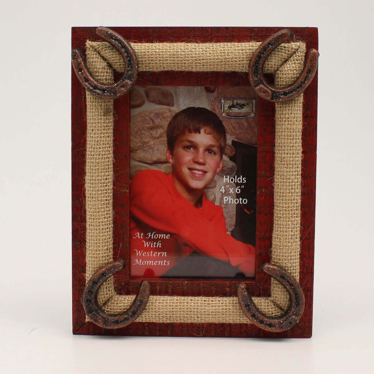 This 4x6 picture frame features burlap with iron horse shoes and red distressed wooden edges. 