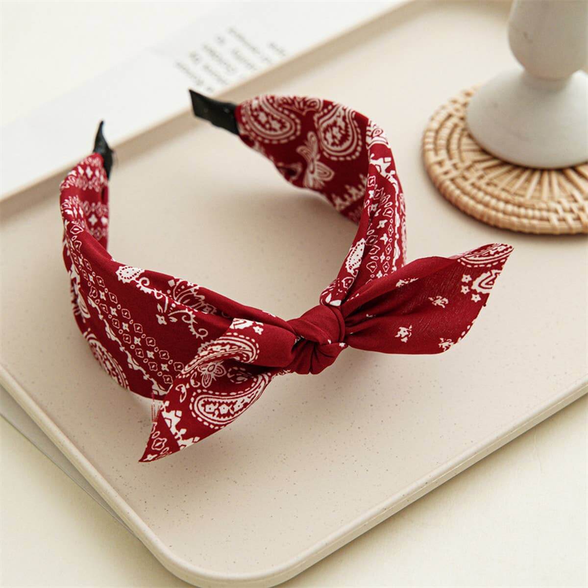 Bandana Bow Headbands featuring a red bandana print and cute bow, perfect for a playful cowgirl look.