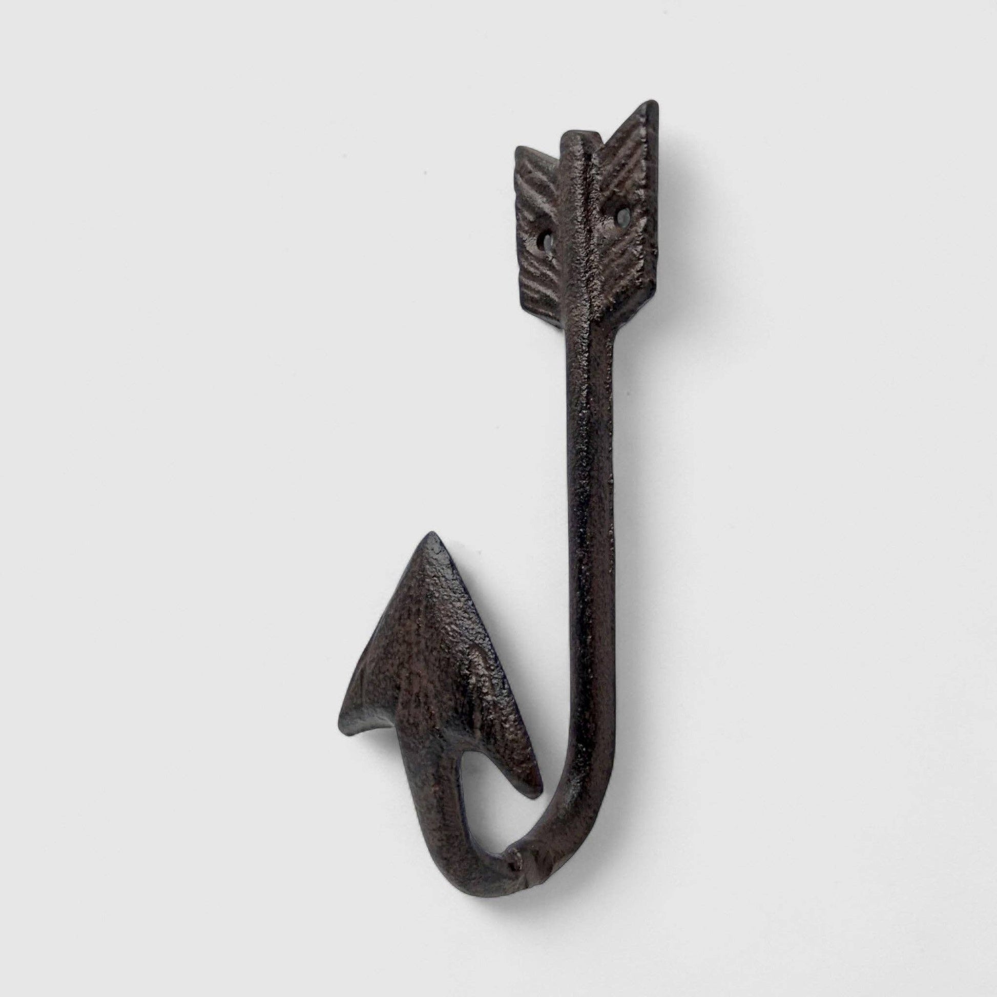 Arrow Head Cast Iron Frontier-Inspired Wall Hook for hanging coats and keys, featuring a vintage arrowhead design.