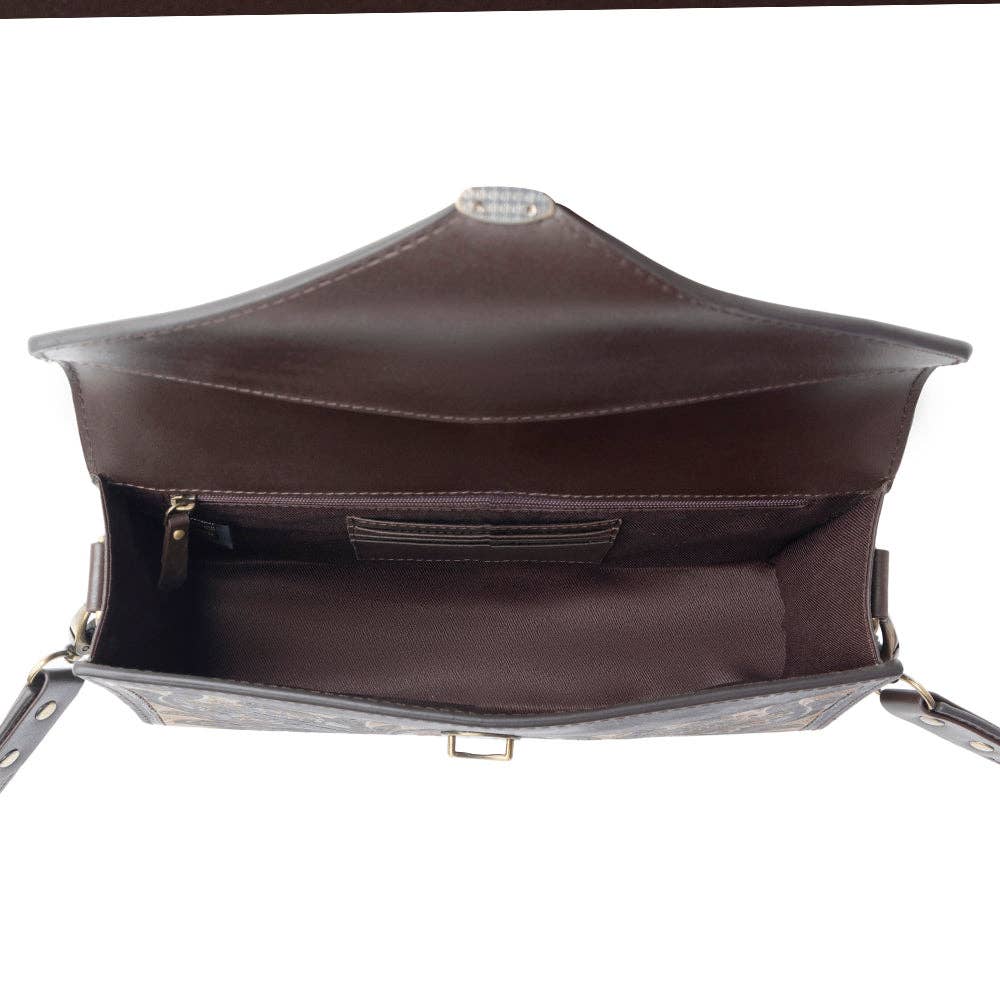 Interior view of the Lark Hand Tool Ladies Western Purse showcasing its spacious and elegantly designed compartments.