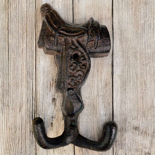Old West Cast Iron Horse Saddle Hook designed for coats, scarves, or horse tack, featuring a rustic finish.