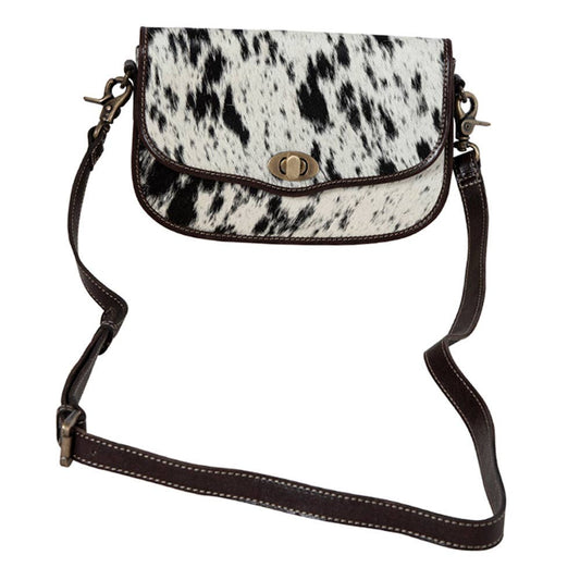 Angus Ridge Leather & Hair-on Bag Hide Purse featuring hair-on hide and adjustable leather shoulder strap.