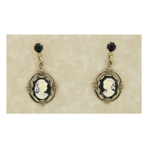 Pair of vintage-style earrings with black and gold design on a beige card.