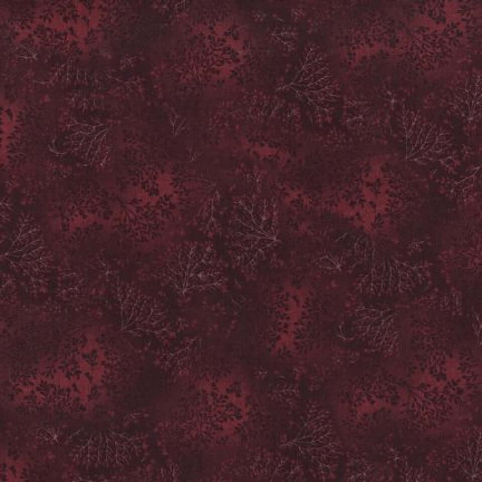 Deep burgundy fabric with intricate leaf pattern, perfect for sewing dresses like the Prairie Dancer Western Dress.