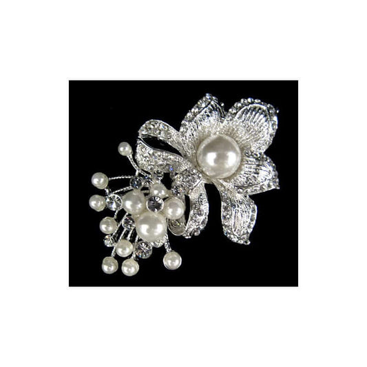 Silver floral brooch with pearls on a black background