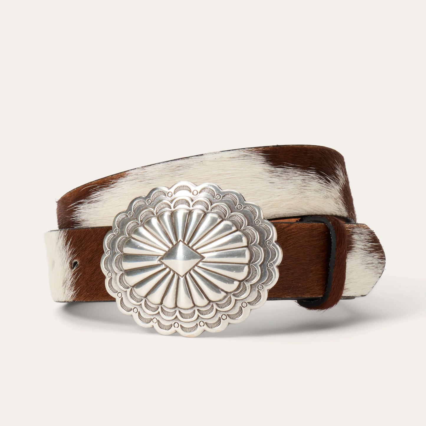 Belt with a decorative silver buckle on a white background