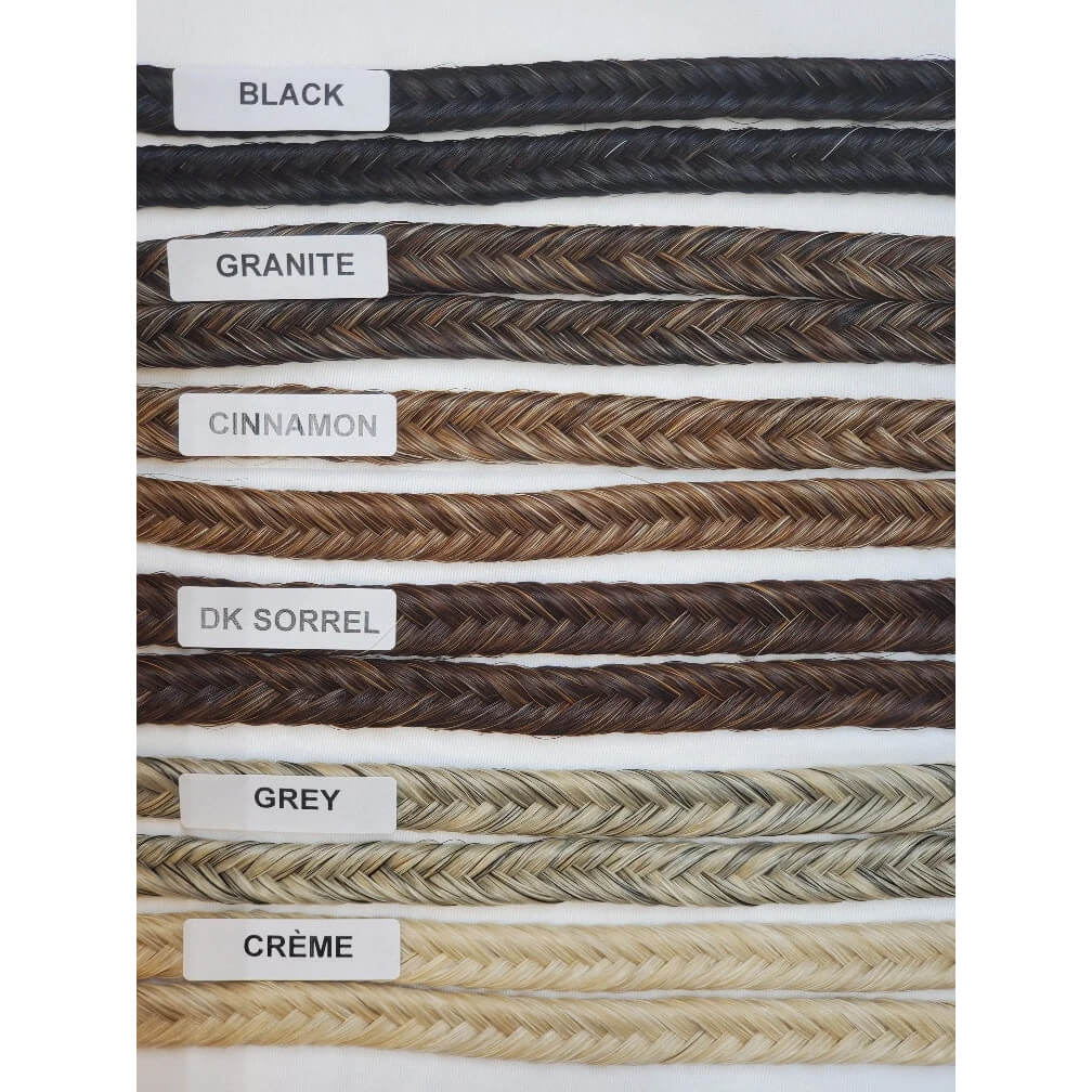 A vertical color chart showing multiple braided hair extensions labeled with names and colors: BLACK, GRANITE, CINNAMON, DK SORREL, GREY, and CRÈME, arranged in horizontal rows on a white background.