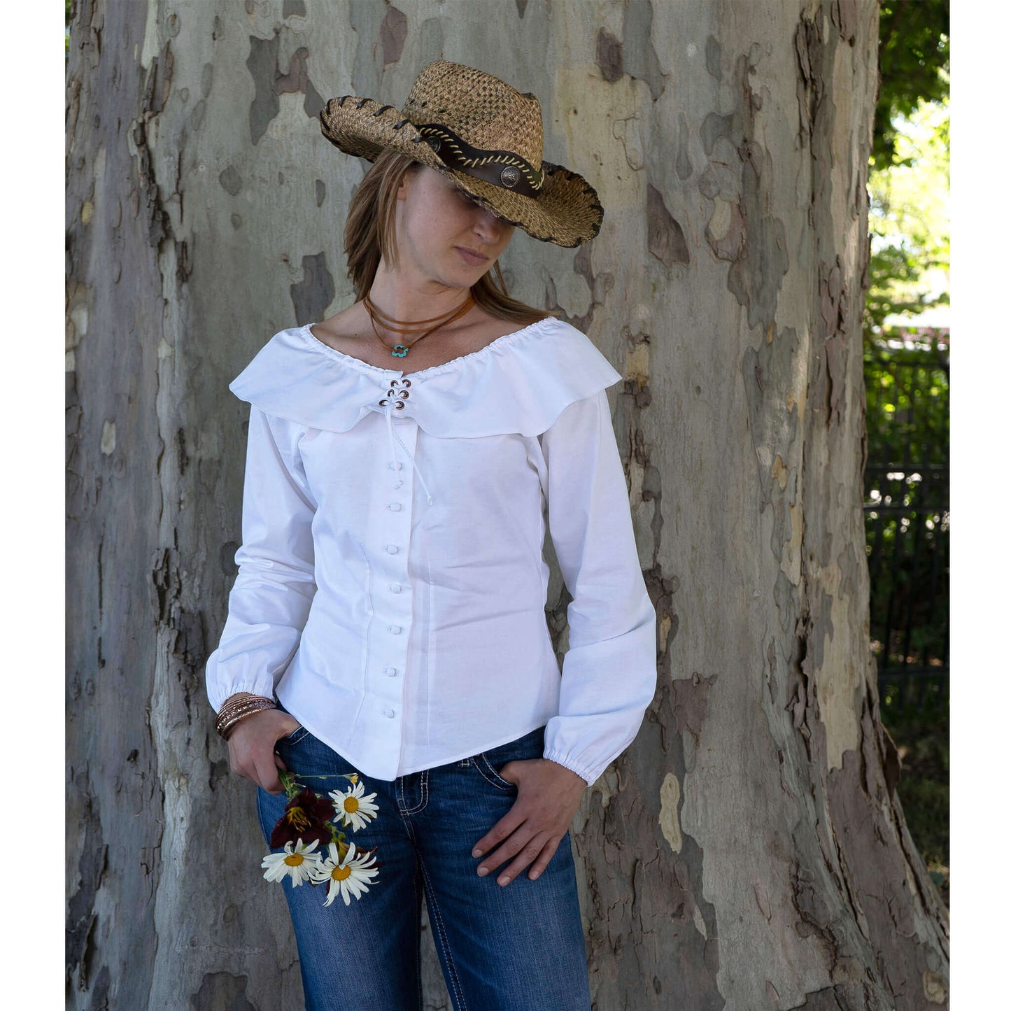 Marston Ladies Western Cowgirl Blouse, off-shoulder design, long sleeves, styled with jeans and hat, outdoor setting.