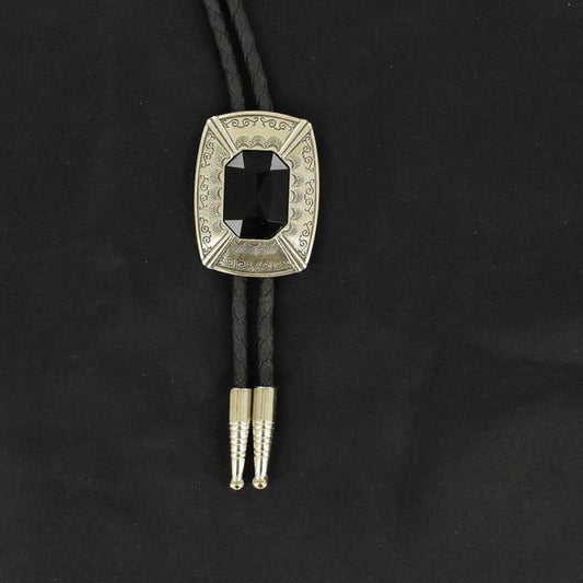 This Bolo tie has a silver rectangle engraved with detail and a black centered stone.  This handsome bolo tie is a great addition that will go with many different attires. 
