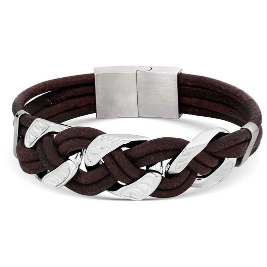 Stand out from the crowd with the Rustic Braided Bracelet. Brown leather and silver tone intertwine with the dark brown cord to create a unique braided design. This bracelet features a slide and lock clasp for ease of wear. Approximately .75" wide and 8.5" long.