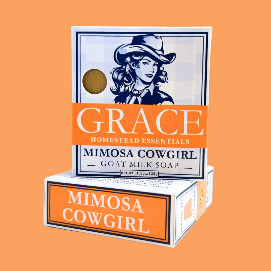 Soap packaging with 'Grace Homestead Essentials' branding on an orange background