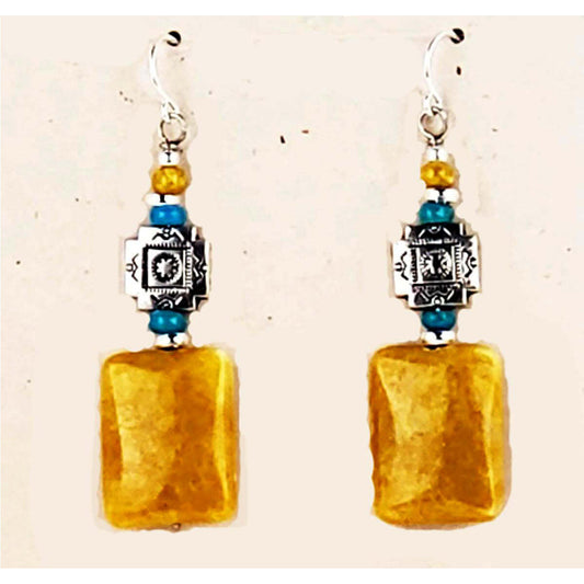 Mustard Jasper is a combination of Chalcedony and Quartz.&nbsp; Measures approx. .50″ wide and 2″ from the base of hypo-allergenic ear wires. Each pair has its own unique features. Handcrafted in USA