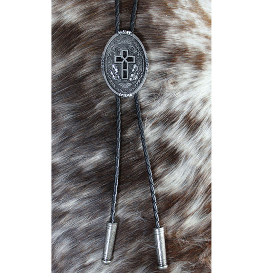 Bolo tie with decorative clasp on a fur background