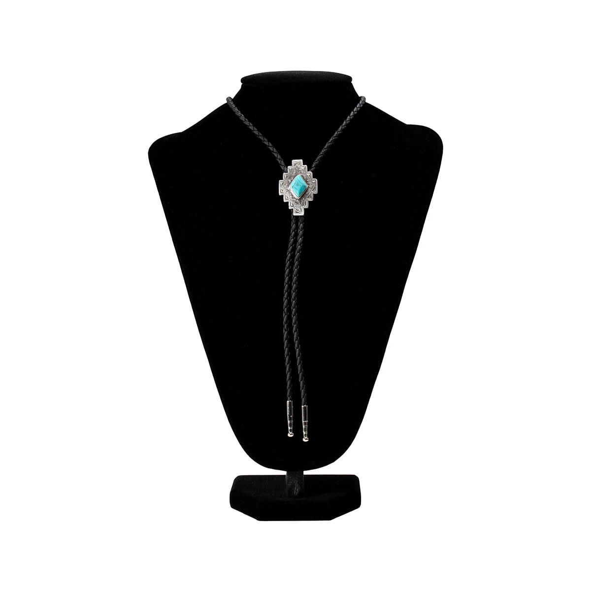 A silver-toned bolo tie necklace with a turquoise-colored central stone, displayed on a black velvet jewelry bust against a white background.