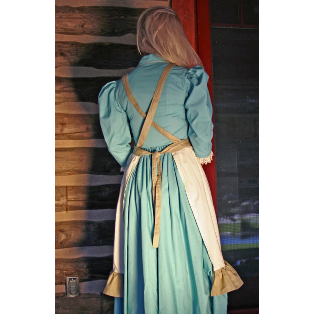 Back view of a vintage Ladies Old West Country Apron with cross-back ties and flounce, perfect for homemakers and collectors.