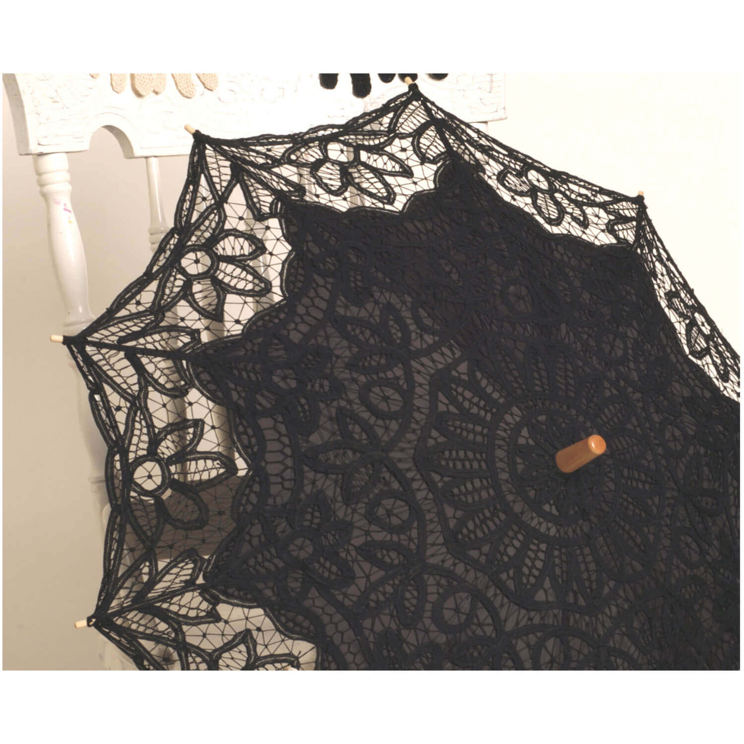 Ladies Western Victorian Lace Parasol in elegant black lace with decorative floral patterns and a wooden handle.
