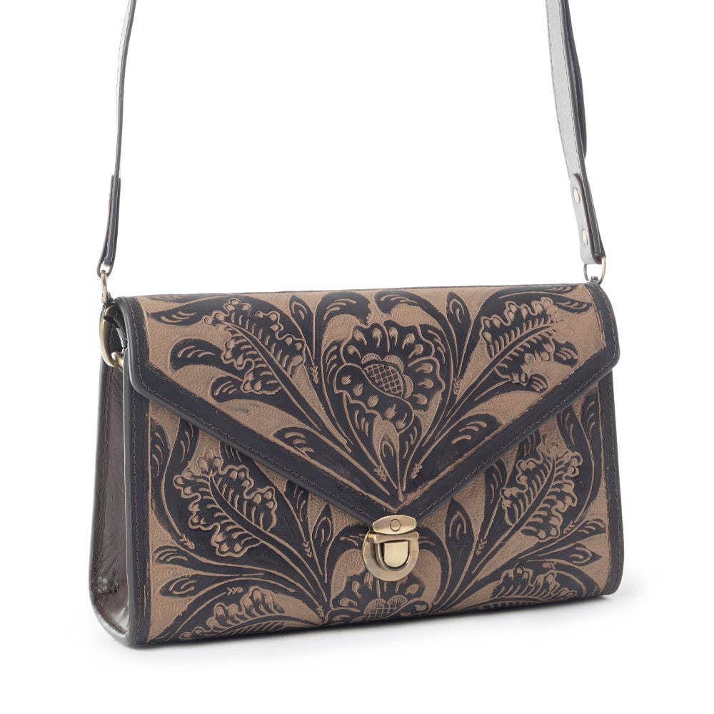 Lark Hand Tool Ladies Western Purse featuring intricate hand-tooled floral design and elegant closure.