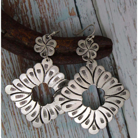 Trendy Silver Strike earrings. Floral square design. Lightweight so these will be comfortable all day long. Very Cowboy Chic! Measure 2-1/2" Long by 2" wide. Imported