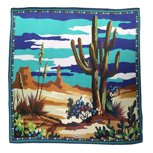 Desert landscape with cactus and mountains on a colorful silk scarf.