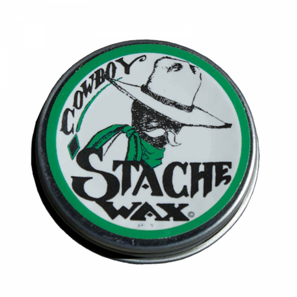 Container of Cowboy Stache Wax with a graphic of a person wearing a hat and green bandana on a white background.